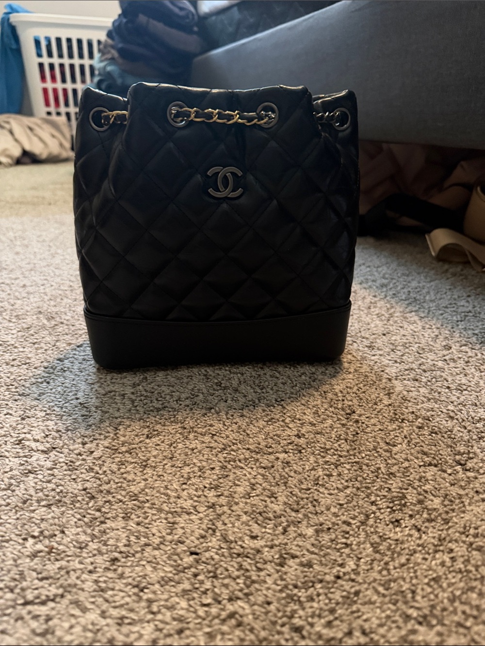 Black Quilted Leather Drawstring Bucket Bag with Gold Chain